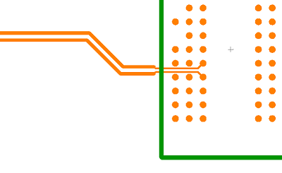 PCB layout view of a differential pair narrowing to a 'neck' width as it passes between component pads